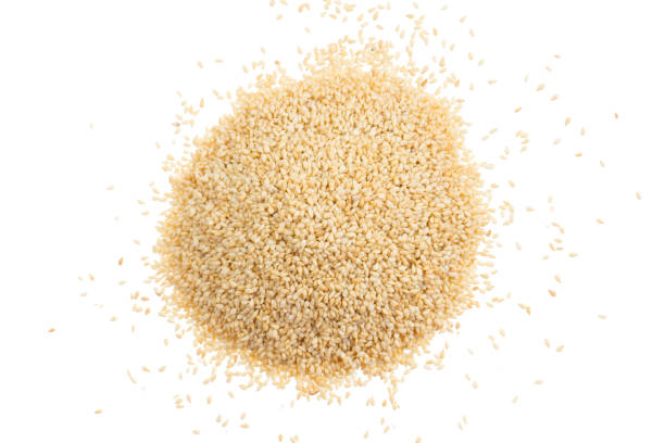 istock Sesame seeds isolated on white background, top view 1081429400