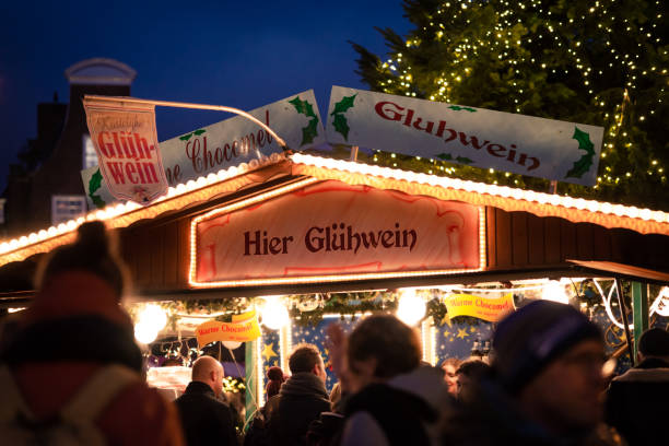 Traditional mulled wine (gluhwein) and hot chocolate (warme chocomel) drink stand at a Christmas market stock photo