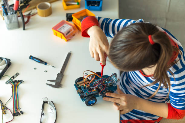 istock Young girl working on a school project 1081452848