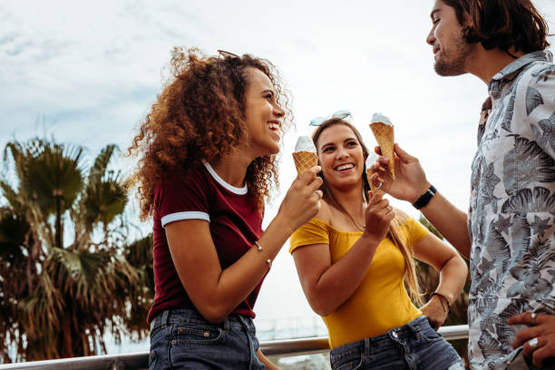 istock Diverse group of friends eating ice-cream 1081455716