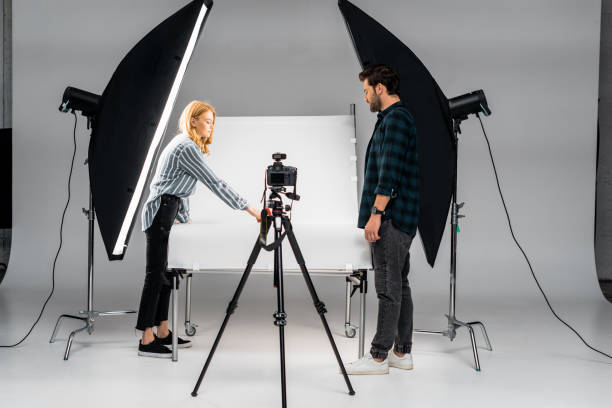 istock young photographers working with professional equipment in photo studio 1081458882
