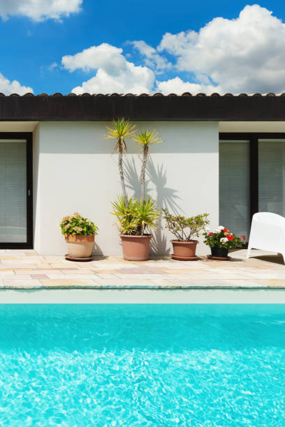 istock Beautiful white house with pool, outdoors 1081459772