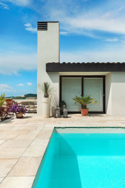 istock Beautiful white house with pool, outdoors 1081460216
