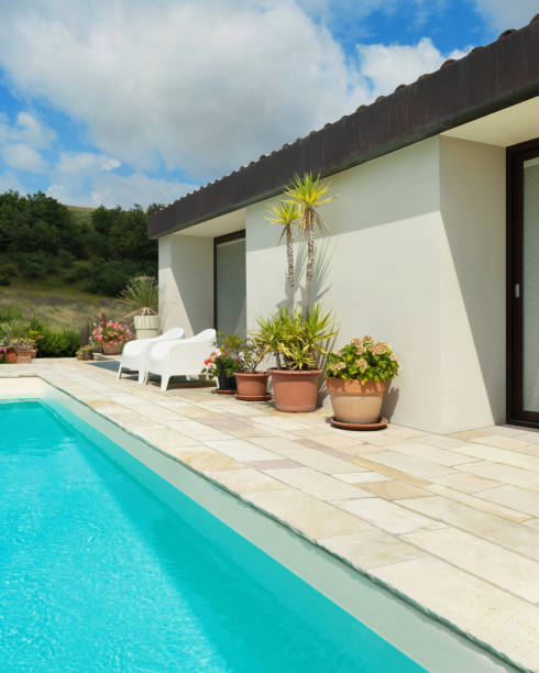 istock Beautiful white house with pool, outdoors 1081463840