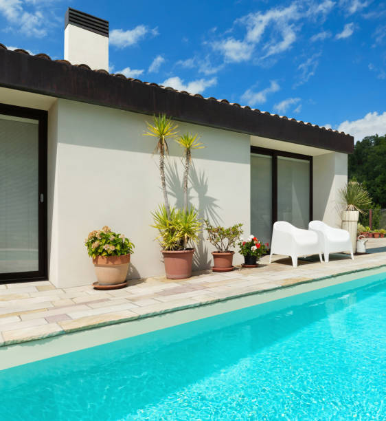 istock Beautiful white house with pool, outdoors 1081464522