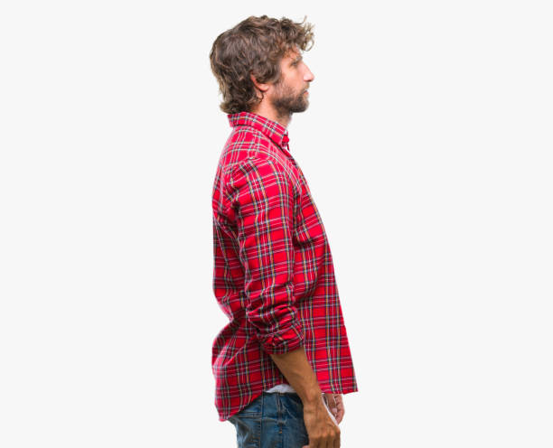 istock Handsome hispanic model man over isolated background looking to side, relax profile pose with natural face with confident smile. 1081478712