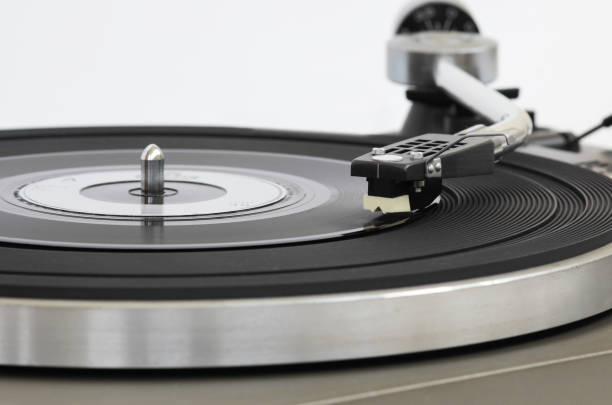 istock Vintage record player with vinyl record. 1081482682