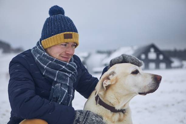 istock Friendship between pet owner and his dog 1081484034