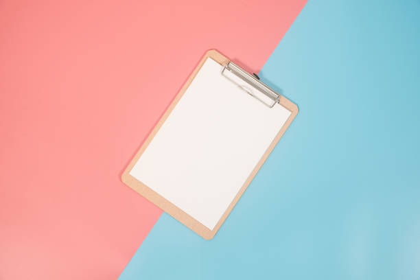 istock clipboard on colorful background with copy space. Flat lay modern and minimal style. 1081484072