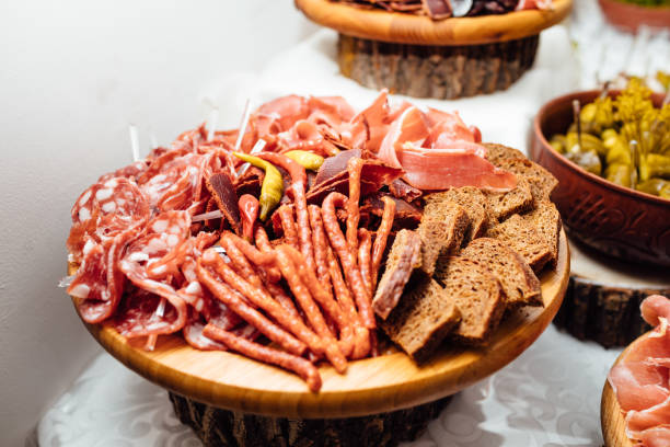 istock Delicious potato chips.  different food snacks. Reception table with snacks. 1081487982
