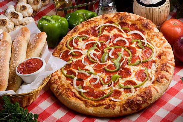 Pizza and Breadsticks  breadstick stock pictures, royalty-free photos & images