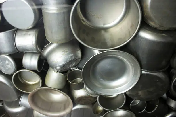 Photo of Enamelware produced at the factory of Oskar Schindler during World War II. Schindler Factory Museum in Krakow.
