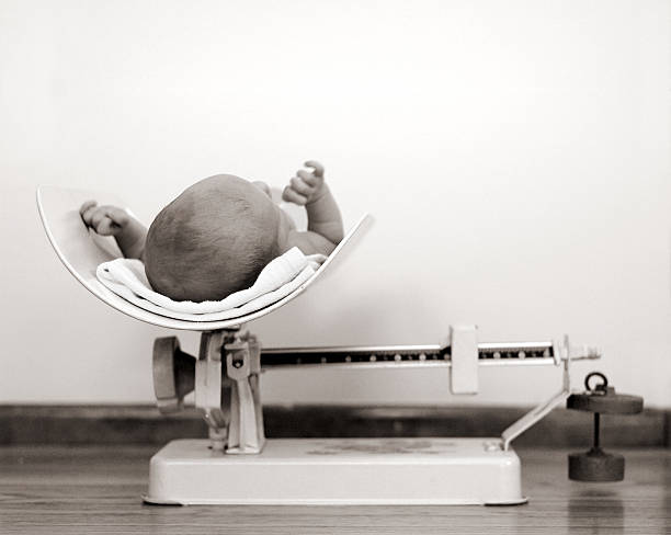 Retro kitchen weight measurement balance on table. Old style filtered photo
