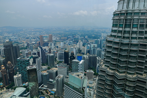 Kuala Lumpur,  Malaysia - 12 April 2016:View of the city center from the top of the famous and touristic Petronas twin towers.