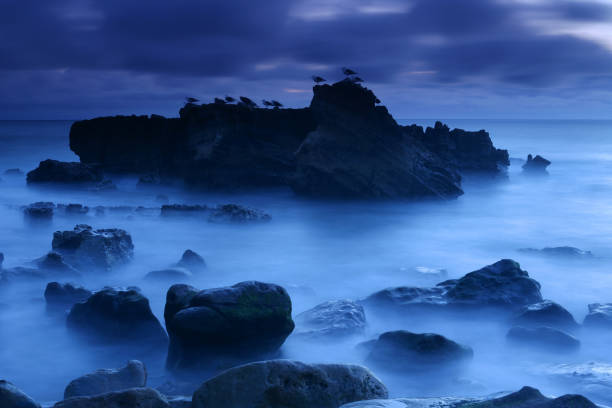 Famous natural attractions in Wanli District, New Taipei City, North Coast, shooting night scenery along the coast, long seconds exposure sea view