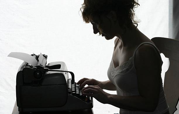 istock Vintage Typewriter and Woman 108149757