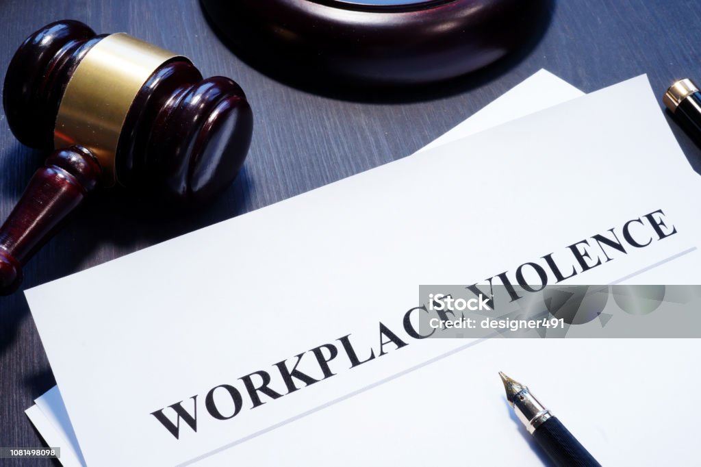 Document about Workplace Violence in a court. Violence Stock Photo