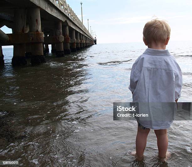 Boy Sea Stock Photo - Download Image Now - Ankle Deep In Water, Blond Hair, Blue