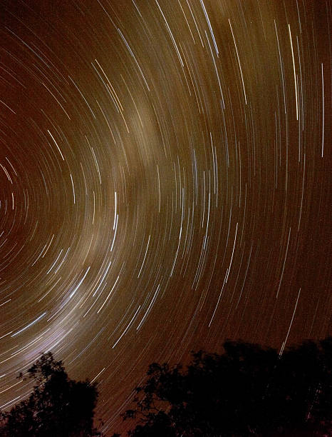 istock Long Exposure of Stars in Sky 108150096
