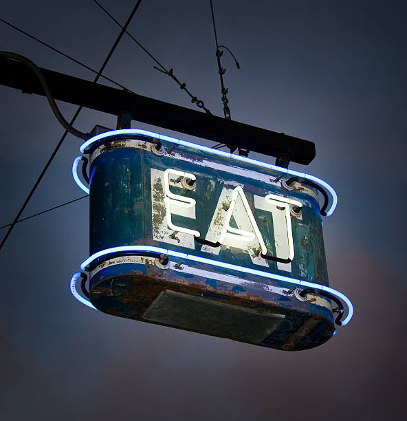 Neon EAT Sign stock photo