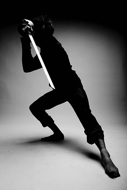 Young warrior holding a ninja sword