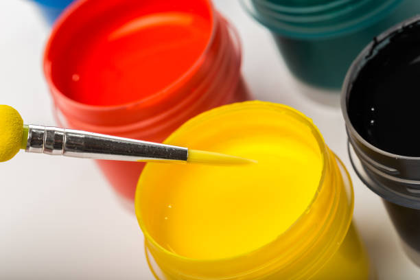 istock bottle paints on white, gouache, brush close up 1081503858