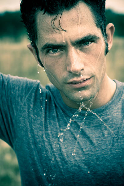 Young Man Water Portrait stock photo