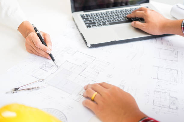 istock Close-Up Of Architects Working On Blueprint 1081509356
