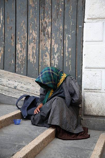 istock Gypsy Woman Begging on Venice Staircase 108151318