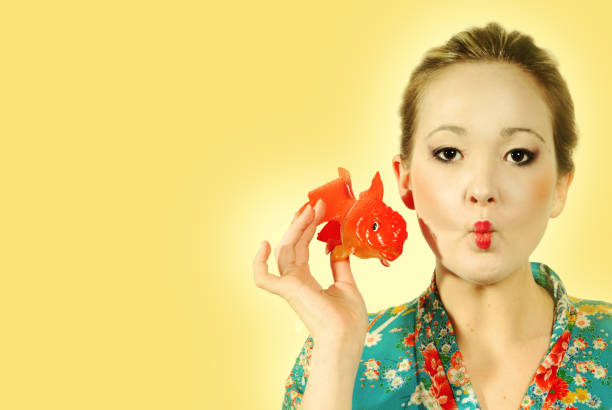 Japanese girl posing as a fish