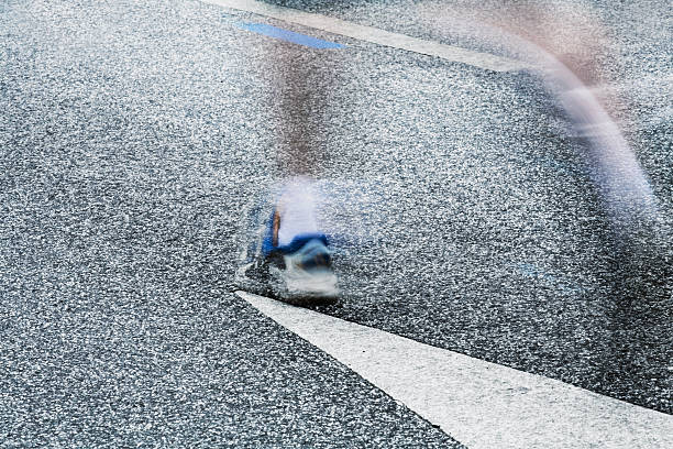 istock Motion Blur of Runner's Legs on Road 108151519