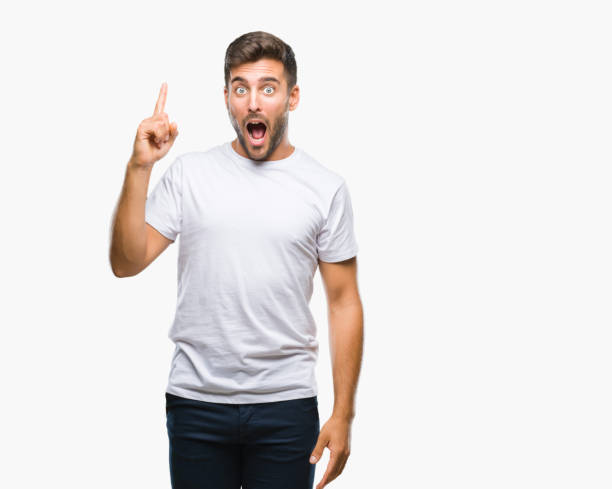 istock Young handsome man over isolated background pointing finger up with successful idea. Exited and happy. Number one. 1081515770