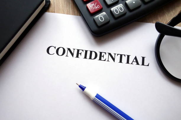istock Confidential document, calculator, pen and glasses 1081516040