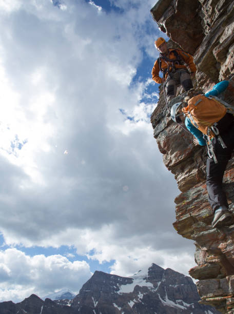 Climber gives a helping hand to other climber