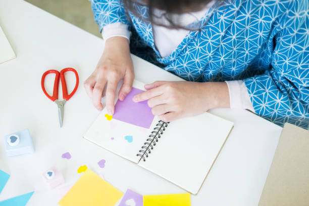 istock Midsection Of Woman Making Craftwork At Table 1081516808
