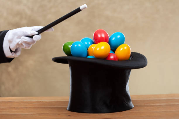 istock Magician hand with magic wand bringing the easter eggs in a hard hat 1081518290