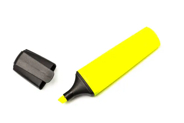 Photo of colour highlighter isolated over a white background, close up plan