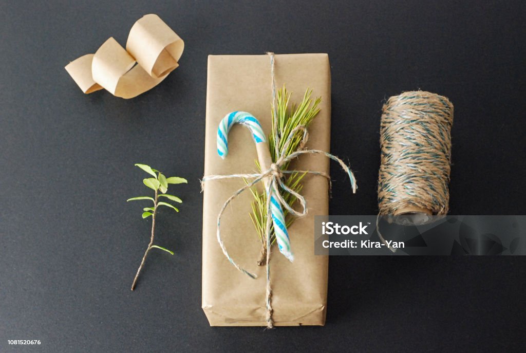 Top View Of Gift Present Wrapped In Recycled Wrapping Paper Stock Photo -  Download Image Now - iStock