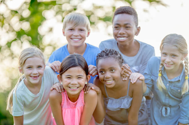 istock Young kids playing in a park 1081521546