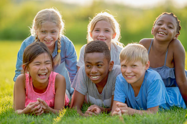 istock Young kids playing in a park 1081521564