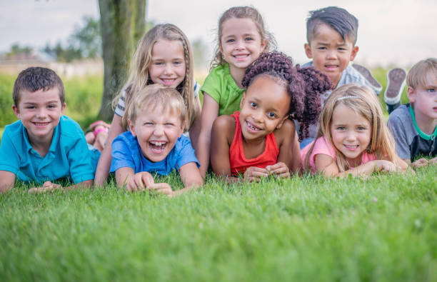 istock Kindergarten kids in a park 1081521582
