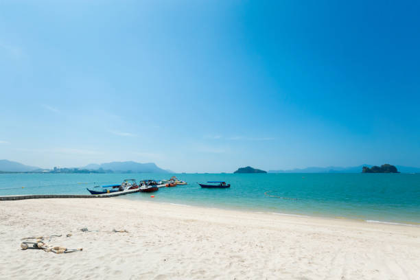 Sunny Teluk Yu beach on tropical Langkawi island in Malaysia. Beautiful nature of south east asia.