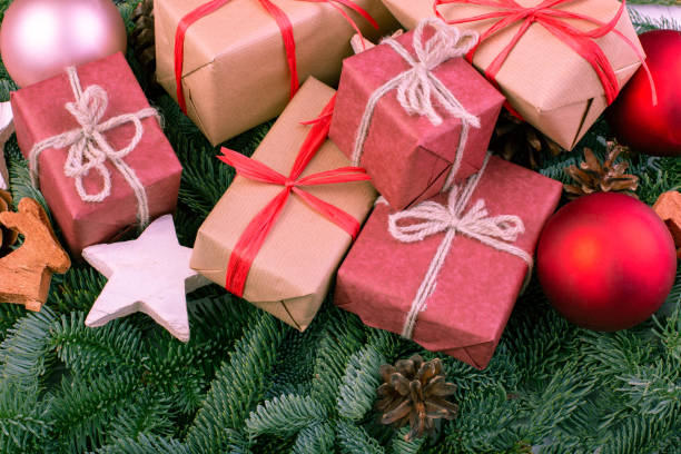 istock Christmas composition. Christmas decorations, fir tree branches with toys gift boxes. greeting card. Flat lay, top view, copy space 1081533418