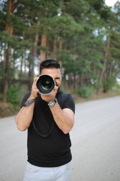 istock Photographer man in nature 1081535942