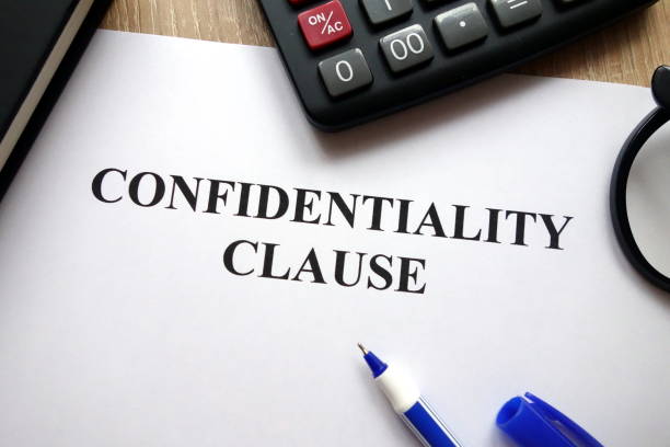 istock Confidentiality clause document, pen, glasses and calculator 1081543744
