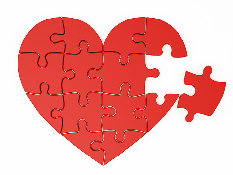 Red Heart Shaped Puzzle on white background