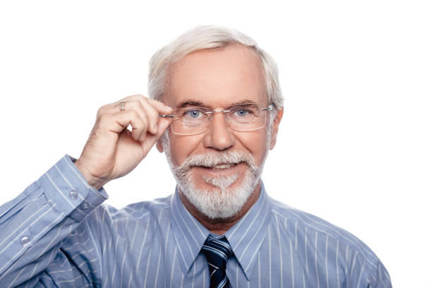 istock Senior handsome man with eyeglasses isolated on white 1081555342