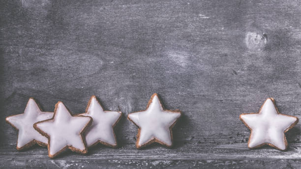 istock cinnamon stars on a wooden surface 1081555890