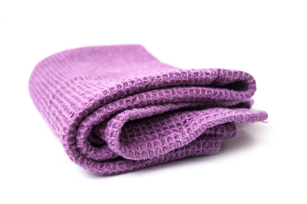 istock purple cleaning towel on white background 1081556372