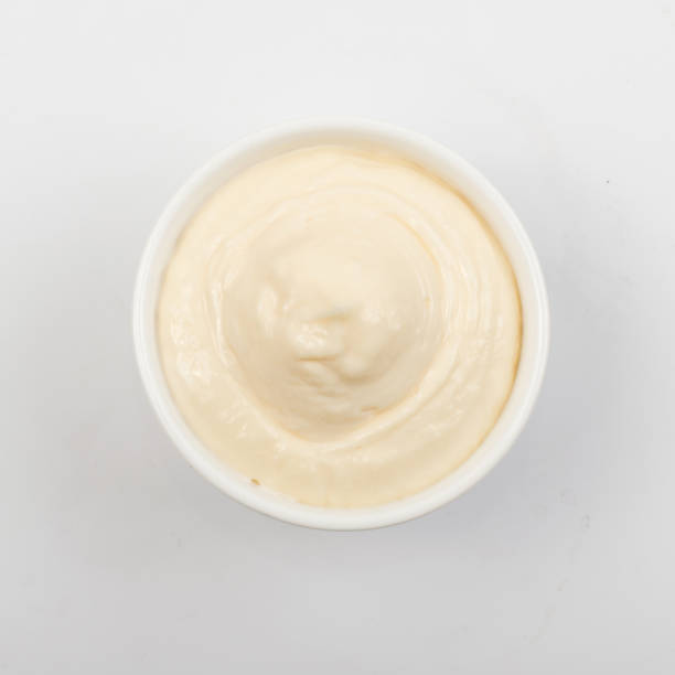 istock Olive Mayonnaise or Mayo Sauce in Small White Bowl Close Up 1081557932